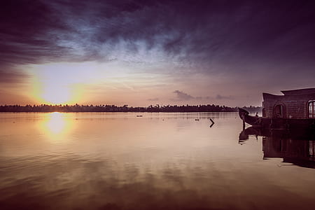 brown gondola boat on water thumbnail