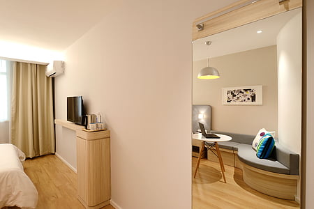mirror on wall inside room thumbnail