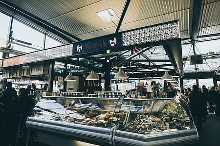 gray metal framed glass display counter with foods thumbnail