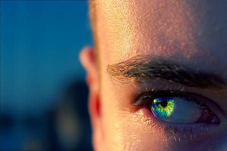 person with blue and green eyes thumbnail