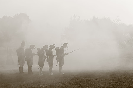 five men standing on a foggy fround thumbnail