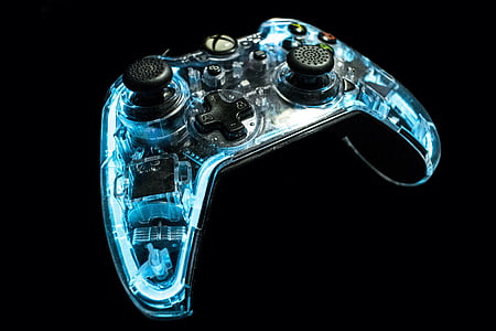 teal and black Xbox 360 wireless controller thumbnail