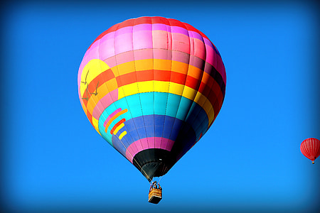 flying multicolored hot air balloon thumbnail