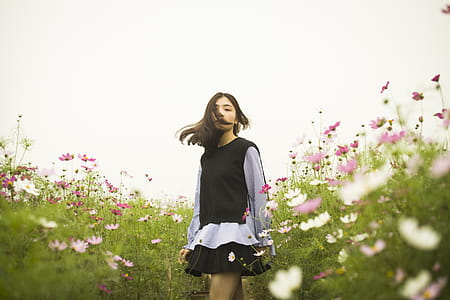 Woman Standing in the Flower Field thumbnail