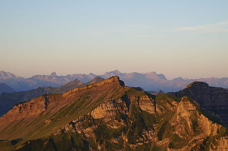 brown rocky mountains during daytime thumbnail