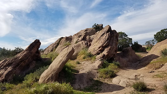 photographed of brown rocky hills thumbnail
