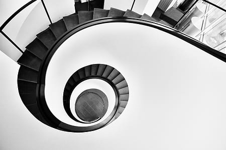 Aerial Photo of Black Spiral Staircase thumbnail