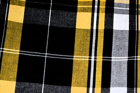yellow, black, and white plaid textile thumbnail