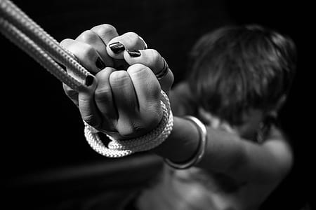 woman tied on a rope thumbnail