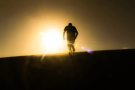 silhouette of man running thumbnail