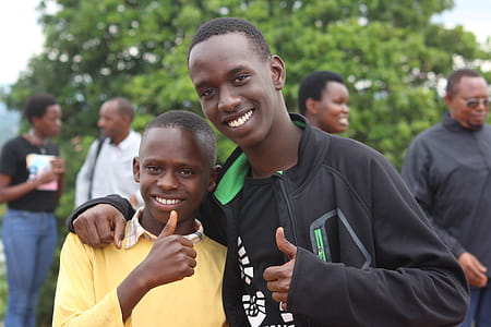 Two Boys Doing Thumbs Up Sign thumbnail
