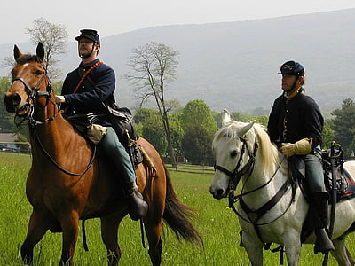 two men riding horse thumbnail