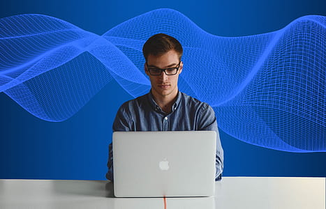 man using silver MacBook thumbnail