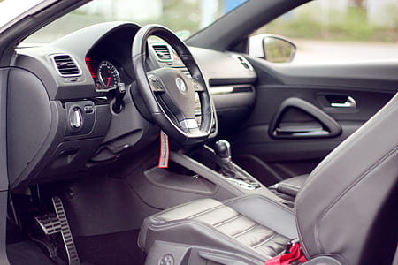 black vehicle steering wheel thumbnail