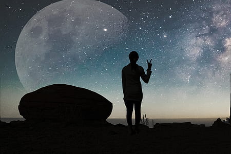 silhouette of man doing peace sign thumbnail