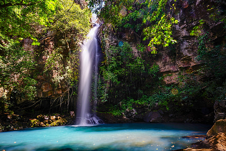 waterfall over blue lagoon thumbnail