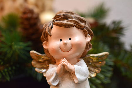 white and gold angel ceramic figurine thumbnail