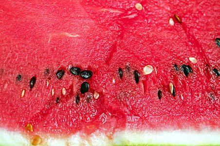focused photo of sliced watermelon and watermelon seeds thumbnail
