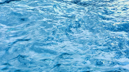 close up photography of moving water thumbnail