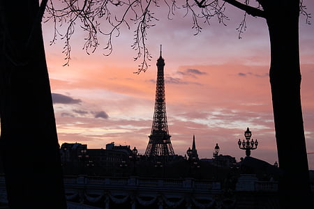 black metal tower at sunset thumbnail