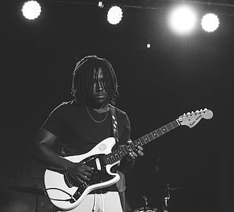 Man Playing Guitar thumbnail