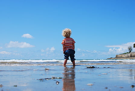 blonde hair child wearing red t-shirt and blue pants thumbnail