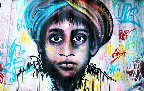 portrait painting of boy on white wall thumbnail