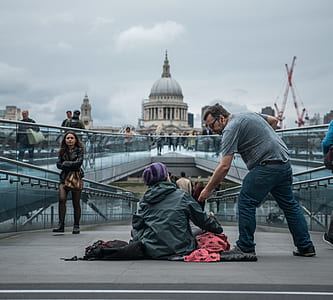person sitting at the road thumbnail
