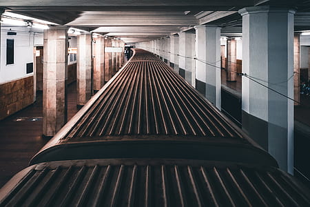train on subway tunnel during daytime thumbnail