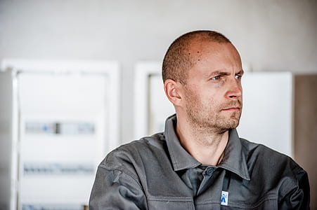 man wearing black button-up collared shirt thumbnail