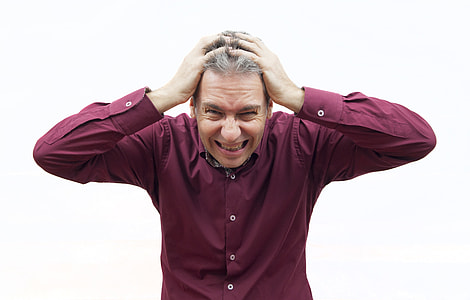 man wearing purple button-up dress shirt thumbnail