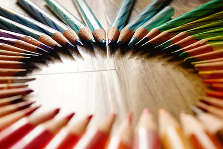 selective focus photography of assorted-color pencil lot thumbnail