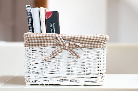 White Wicker Case Filled With Books thumbnail