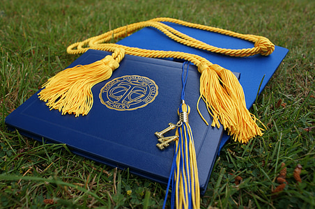 blue graduation book and hatg thumbnail