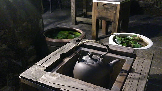 black kettle near succulent plant during daytime thumbnail