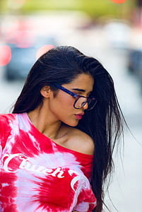 depth photography of woman in pink and red scoop-neck top thumbnail