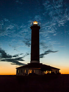 white and brown lighthouse during sunset thumbnail