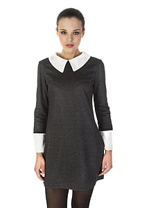 woman wearing black and white pan collared long-sleeved dress thumbnail