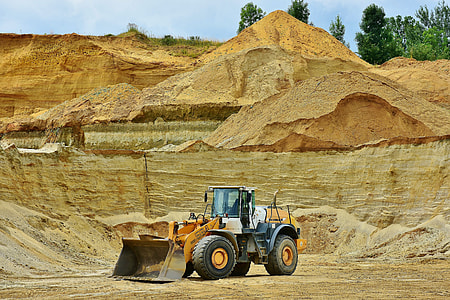 yellow and white backhoe loader thumbnail