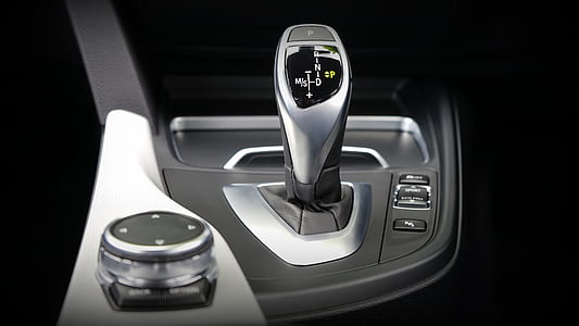 closeup photo of gray vehicle gear shift knob thumbnail