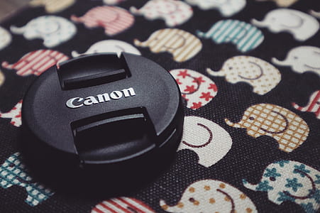 Round Black Canon Lens Cover thumbnail