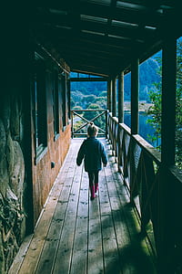 girl on wooden hallway thumbnail