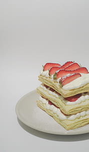 Biscuits With Cream and Sliced Strawberry Toppings thumbnail