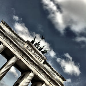 low-angle shot photography of horse statues thumbnail