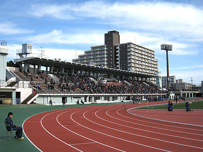 track field filled with people thumbnail