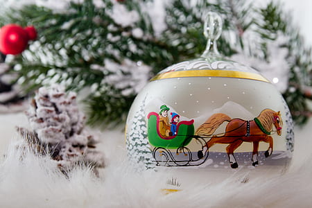 horse sleigh ornament on white fur textile thumbnail