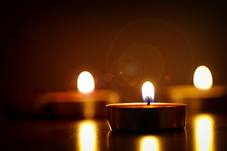 Close-up Photography of Lighted Candles thumbnail