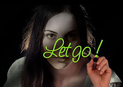 woman wearing white shirt with let go! text overlay thumbnail