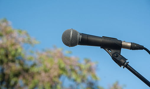 selective focus photography of microphone thumbnail
