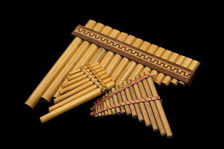 three brown bamboo musical instruments thumbnail
